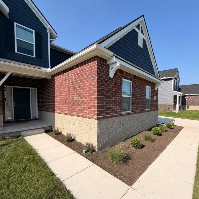 Residential landscape mulch and foundation planting by Legacy Lawn And Landscape