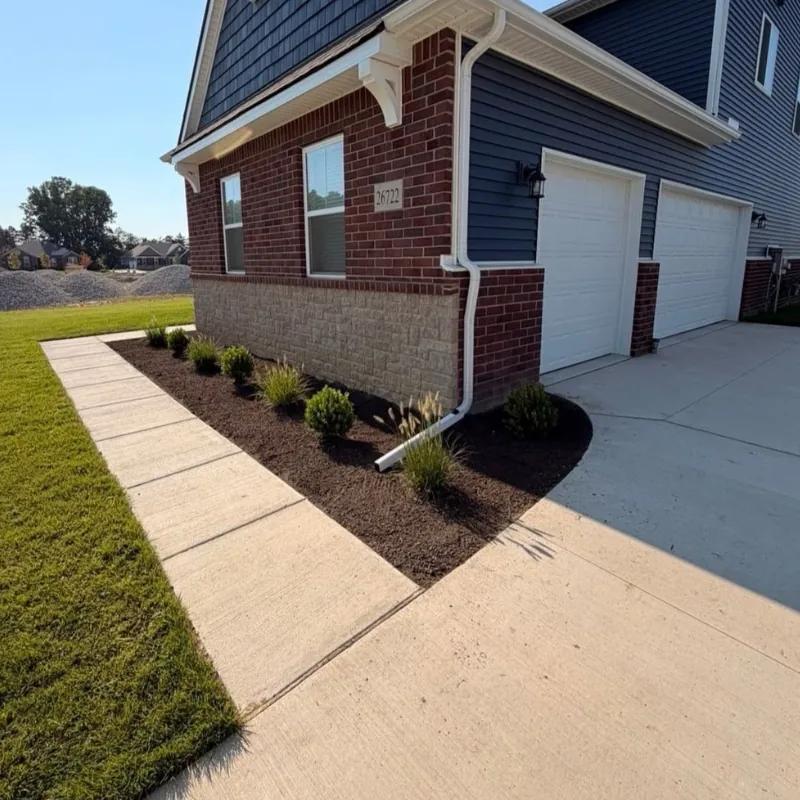 Residential foundation bed, walkway, and shrub landscaping by Legacy Lawn And Landscape